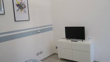 1 chambre, bureau, fer et planche à repasser, Wi-Fi gratuit