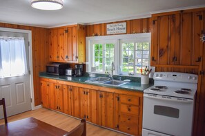 Fridge, microwave, oven, stovetop - Three bedroom located 1 mile from Sea Street Beach (Dennis Port)