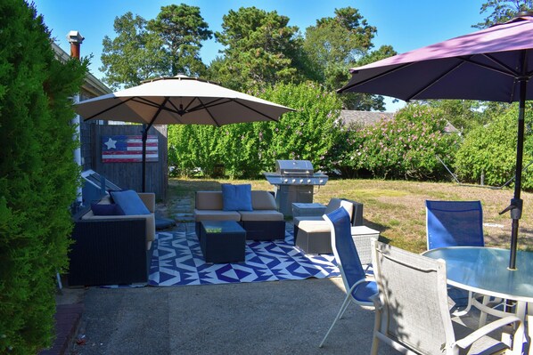 Outdoor dining - Three bedroom located 1 mile from Sea Street Beach (Dennis Port)