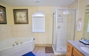 Shower, jetted tub, hair dryer, towels