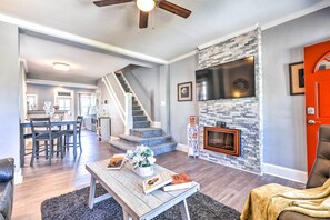 TV, fireplace, books