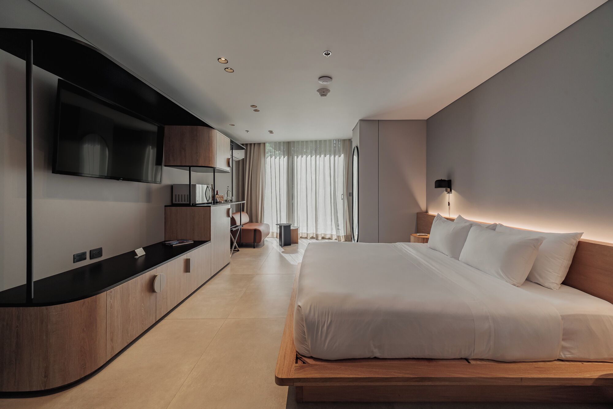 Lägenhet Standard - 1 queensize-säng - terrass | Minibar, värdeförvaringsskåp på rummet och mörkläggningsgardiner