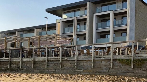 A multi-story hotel with balconies, outdoor seating, and a sandy beach in the foreground. - 24 Breakwaters - Sandown Bay - Isle of Wight (Sandown)