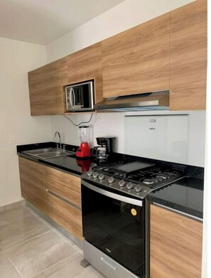 Fridge, microwave, oven, coffee/tea maker