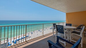 A balcony with a view of the beach and ocean. - Treasure Island 0809 (Panama City Beach)