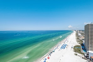 Enjoy access to a long, sandy beach with lounge chairs and umbrellas.