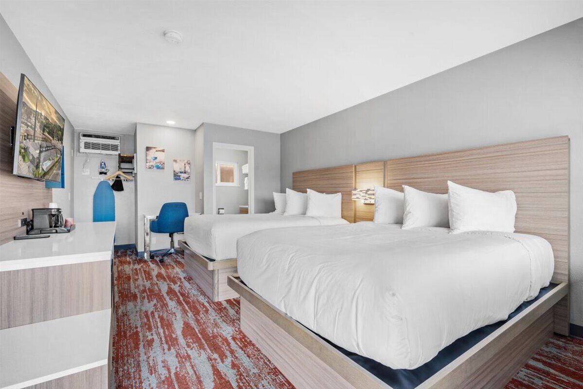 Standard Room, 2 Queen Beds, Non Smoking | Desk, iron/ironing board, free WiFi, bed sheets