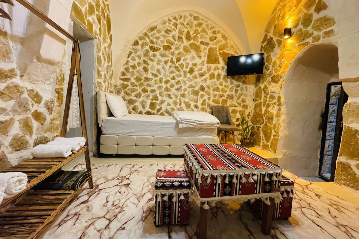 Premium Üç Kişilik Oda | Kaliteli yatak takımı