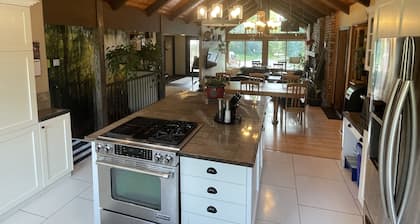 Spacious Chalet with BRAND NEW hot tub 5 mins from beach -sleeps 14