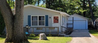 Family sized updated cottage with garage -Fenced in yard for pets.. 
