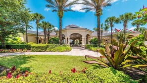 Enter a serene oasis with a beautifully maintained garden and a striking architectural design.