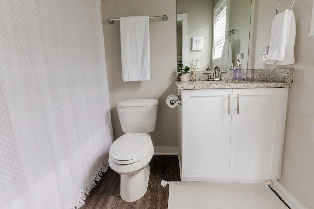 Combined shower/tub, hair dryer, towels, soap