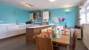 Fridge, dishwasher, electric kettle, cookware/dishes/utensils