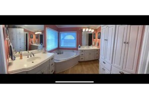 Bathtub, jetted bath, hair dryer, towels