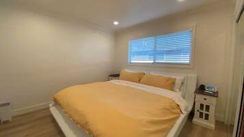 2 bedrooms, desk, iron/ironing board, travel crib