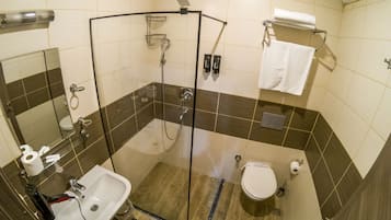 Twin Room | Bathroom | Shower, rainfall showerhead, hair dryer, slippers