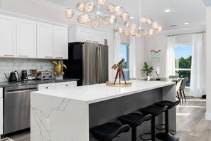 Fridge, microwave, oven, stovetop - Lakefront Home. Insane Views - Pool/Spa! Gameroom! (Kingsland)