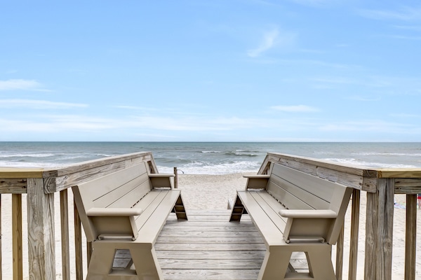 On the beach, sun-loungers, beach towels