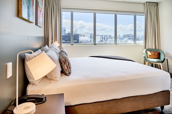 Premium bedding, pillowtop beds, in-room safe, blackout drapes
