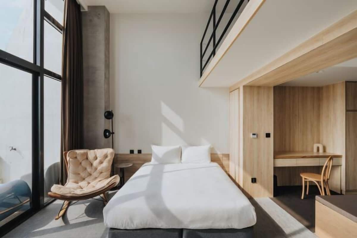 Couette en duvet, rideaux d’obscurcissement, accès au Wi-Fi (inclus)