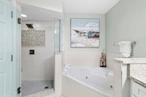 Shower, hair dryer, towels, shampoo
