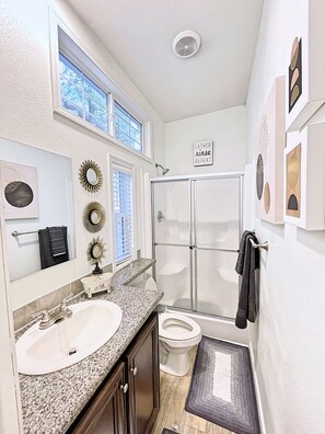 Shower, hair dryer, towels, soap