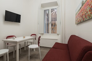 Habitación cuádruple Deluxe | Wifi gratis y ropa de cama 