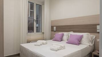 Quarto quádruplo luxo | Wi-Fi de cortesia, roupa de cama