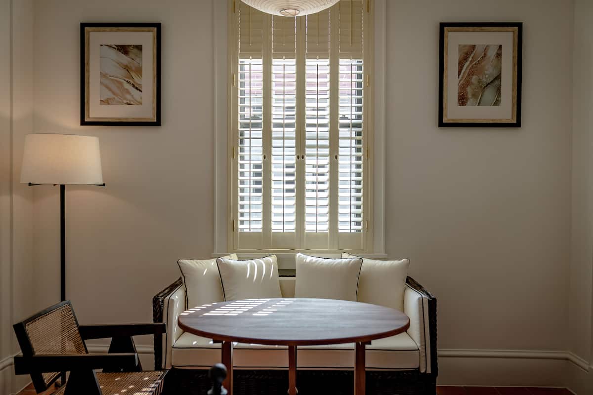 Deluxe King Bed Room | Living area | 50-inch Smart TV with satellite channels, TV