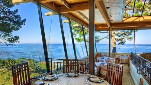 Jacuzzi and fireplace villa with ocean views of Point Lobos and dramatic sunsets