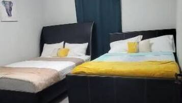 2 bedrooms, desk, iron/ironing board, travel crib