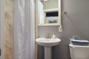 Combined shower/tub
