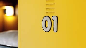 A yellow storage cabinet with the number 01 on it.