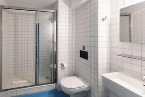 Shower, hair dryer, soap, shampoo