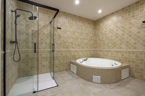 Bathtub, hair dryer, towels