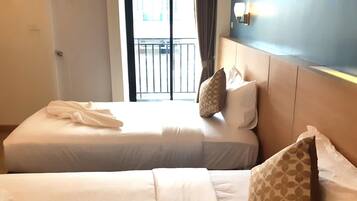 Deluxe Twin Room, 2 Bedrooms | Desk, blackout drapes, free WiFi, bed sheets