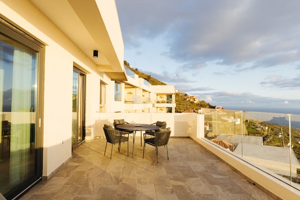 Family Villa | Living area | 55-inch Smart TV with digital channels, TV