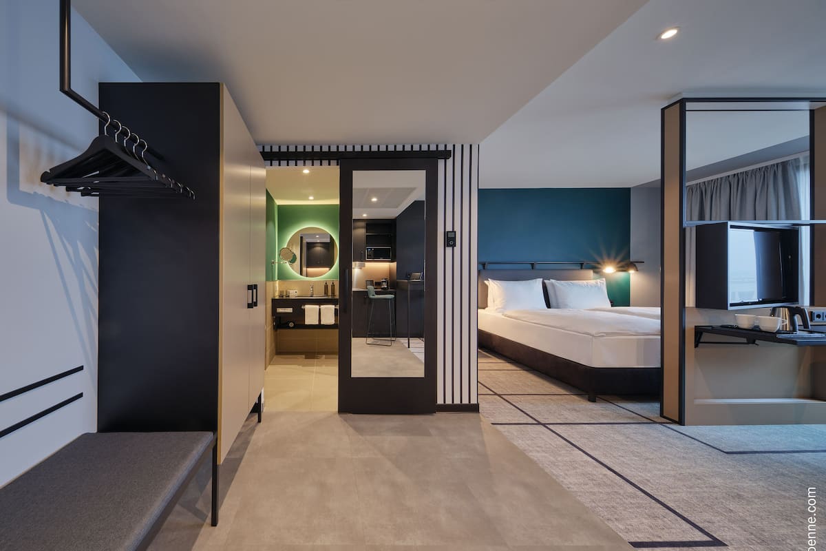 Hypo-allergenic bedding available, in-room safe, desk, laptop workspace