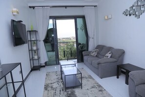 Living area - Modern, Stylish & Homely Apt w/wifi*pool*gardens (Kampala)