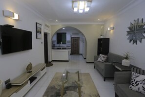 Living area - Modern, Stylish & Homely Apt w/wifi*pool*gardens (Kampala)
