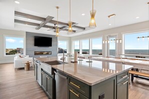 Fridge, microwave, oven, stovetop - 10 Oars: Luxurious 10-bedroom oceanfront home in Oak Island, perfect for large gatherings. (Oak Island)