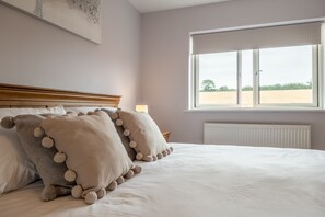 4 bedrooms, iron/ironing board, travel crib, internet