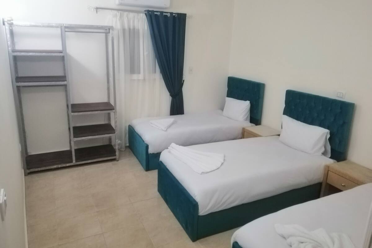 Egyptian cotton sheets, premium bedding, blackout drapes, WiFi (free)