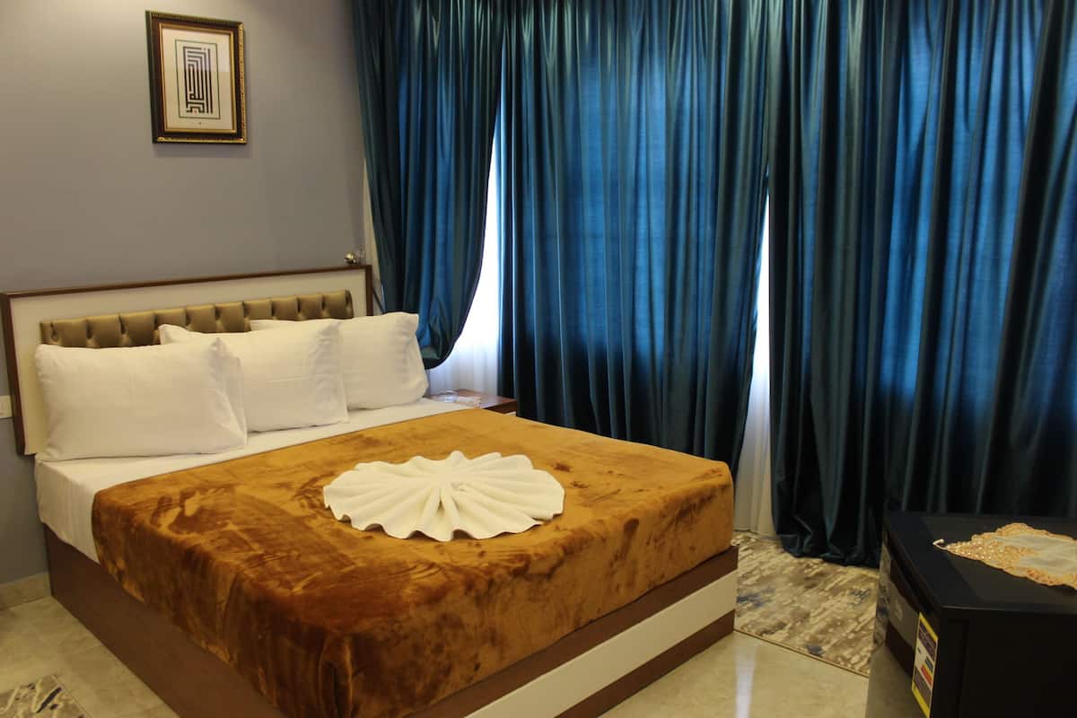 Habitación individual Deluxe | Sábanas de algodón egipcio y ropa de cama de alta calidad