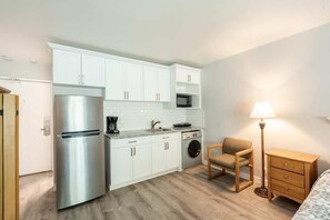 Studio | Private kitchen | Full-size fridge, microwave, stovetop, coffee/tea maker