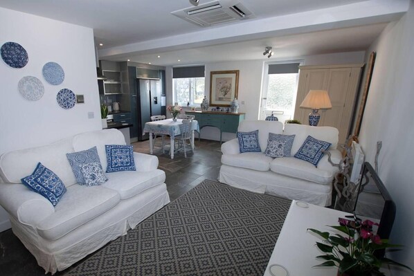 Appartement, meerdere bedden | Woonkamer