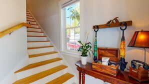 A staircase with wooden steps and a white wall. - Quiet Historic Retreat - 15 minutes from Riverwalk (Wilmington)