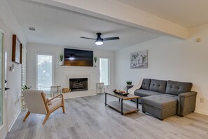 Signature Townhome, 3 Bedrooms, Balcony, River View | Living room | 65-inch Smart TV with cable channels, TV, fireplace - Beautiful 3BR Townhouse (Augusta)