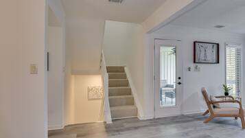 Signature Townhome, 3 Bedrooms, Balcony, River View | Living area | 65-inch Smart TV with cable channels, TV, fireplace