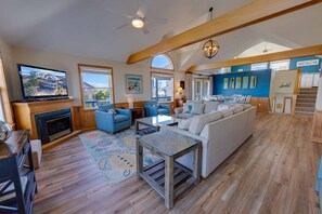 Smart TV, books - Semi-Oceanfront Home in Avon with Hot Tub, Smart TVs, and Basketball Hoop (Avon)